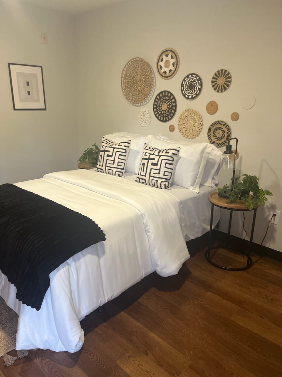 A bedroom inside a Midtown Village room 